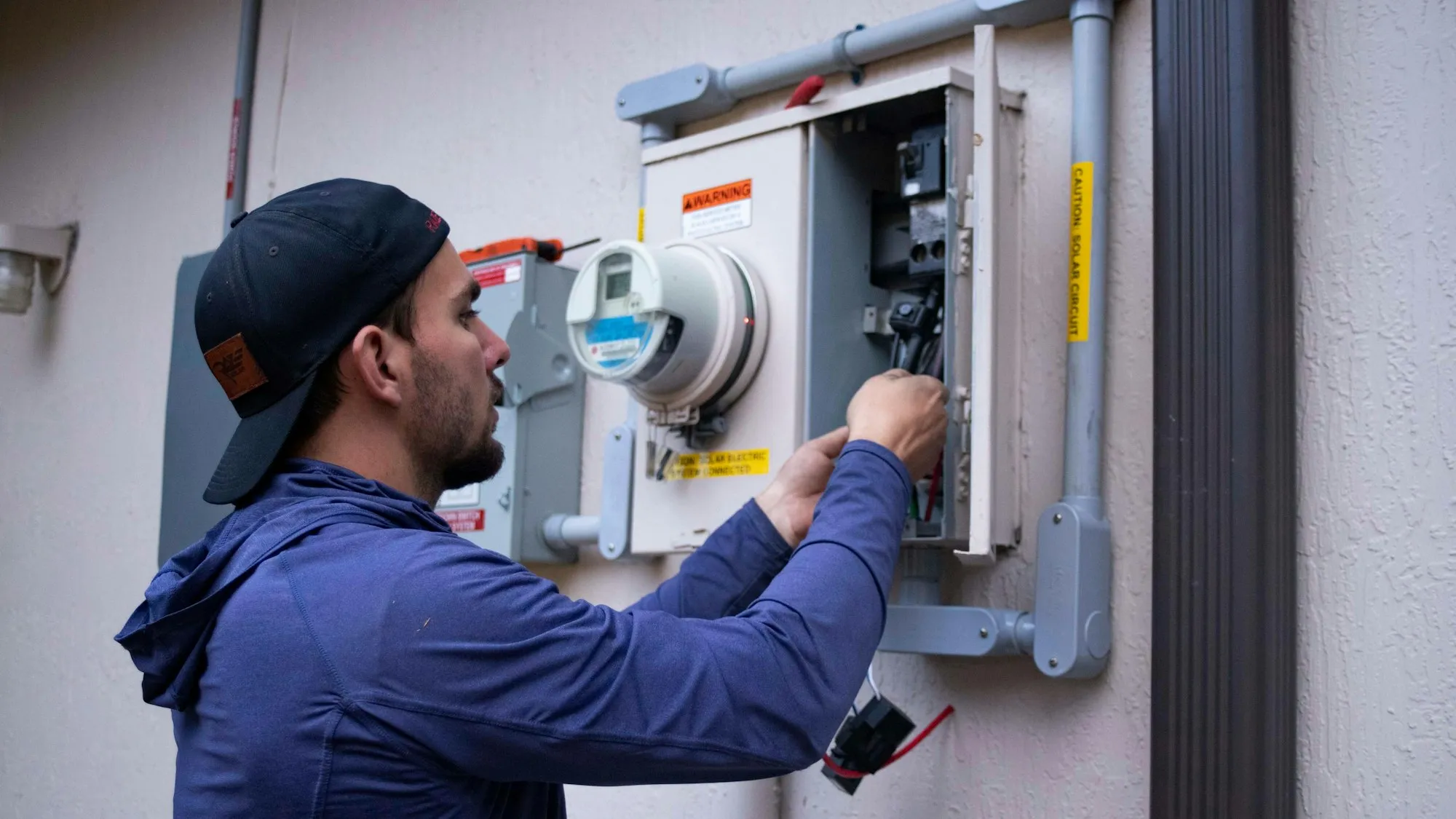 Technician working on an electrical meter