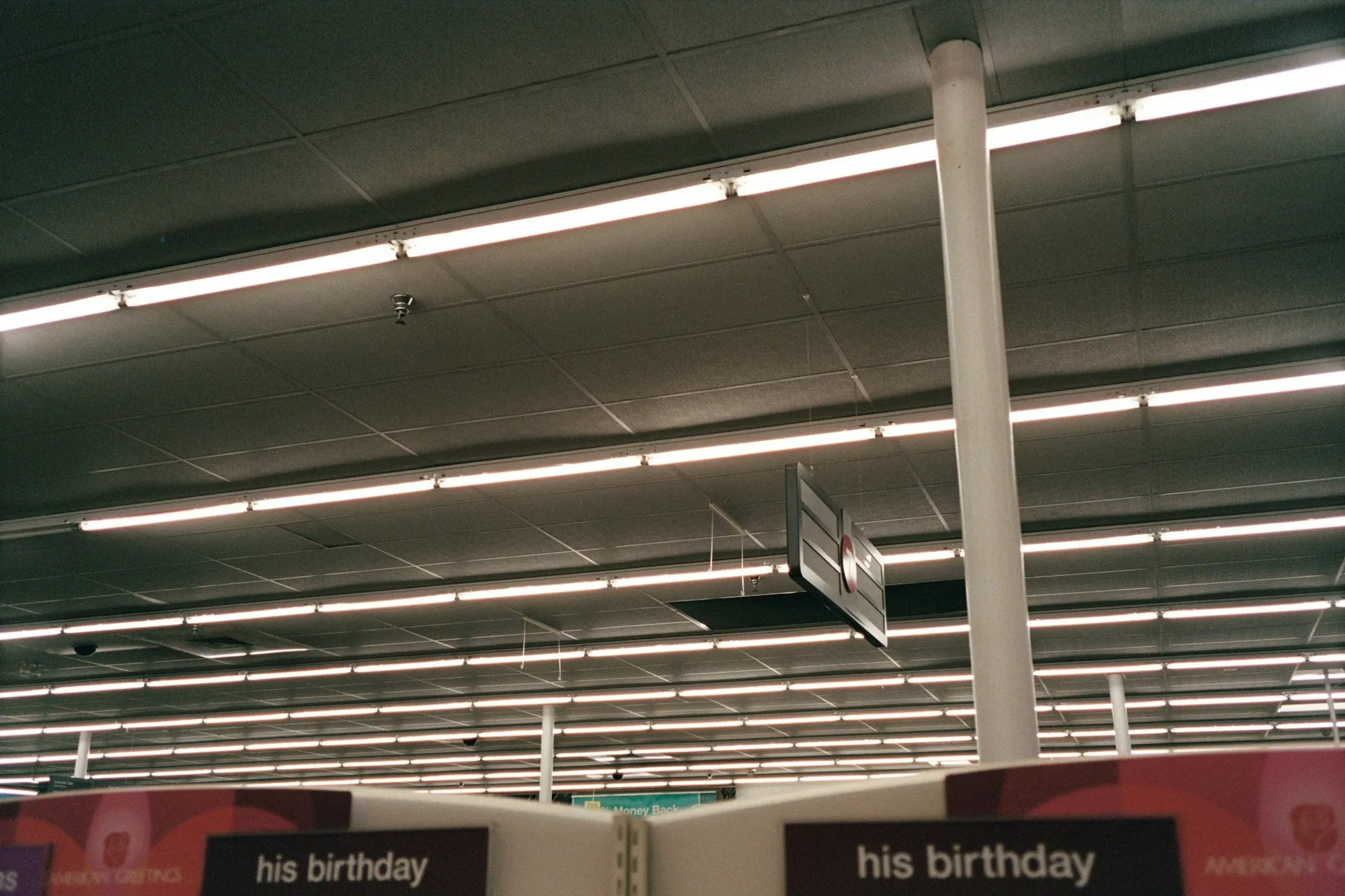 Retail store interior with overhead lighting