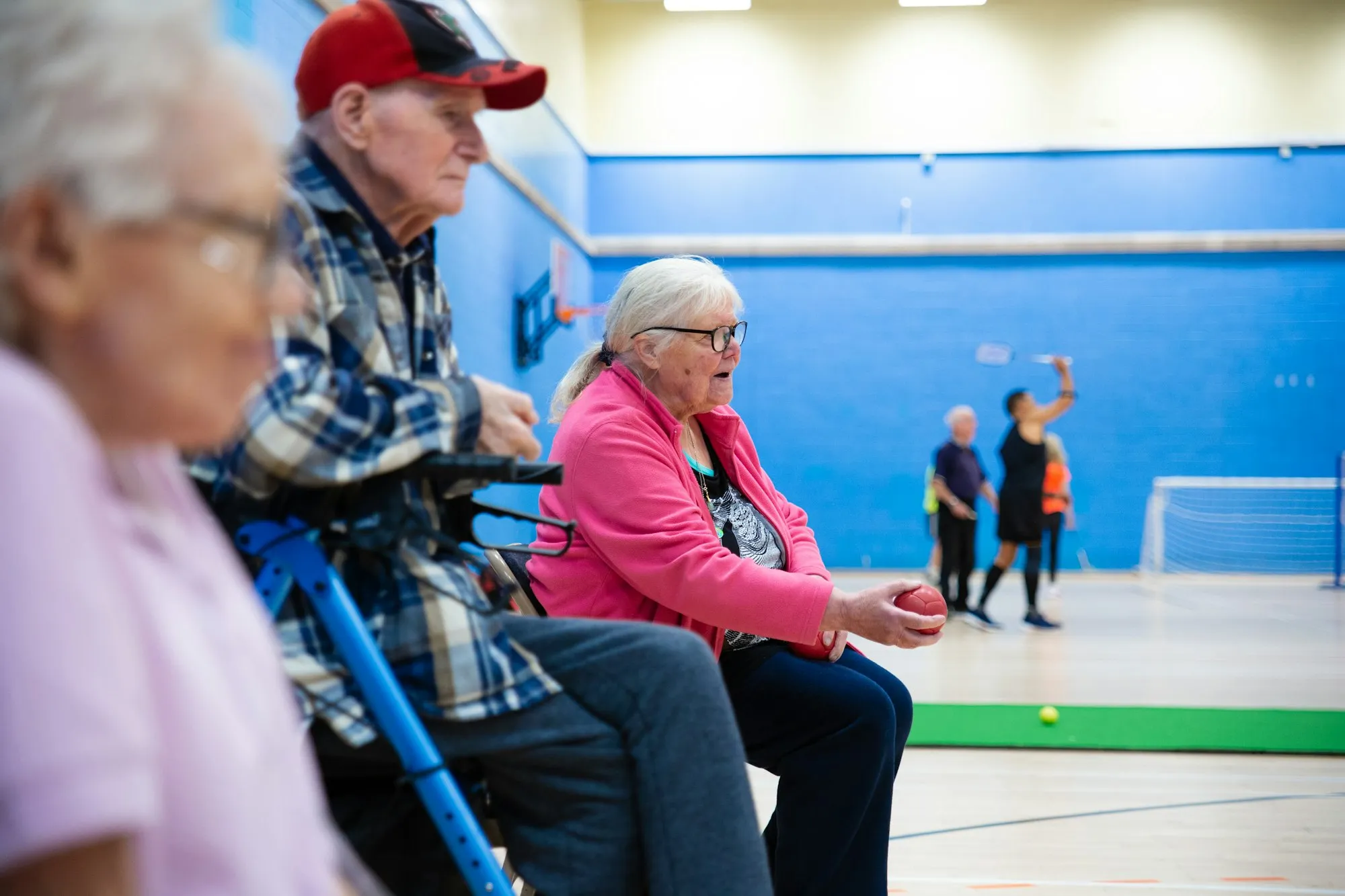 Seniors taking part in an activity in a recreation room